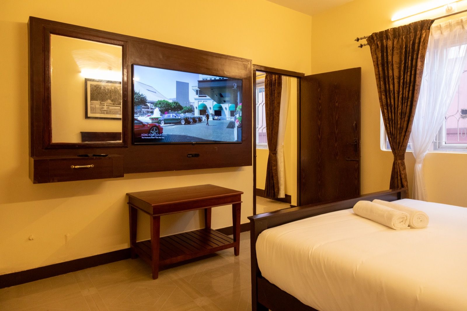 Luxury triple room at Aakash with its separate interior bedroom